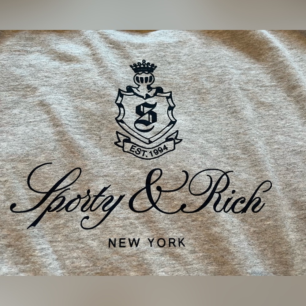 Sporty and a rich grey sweater unisex M